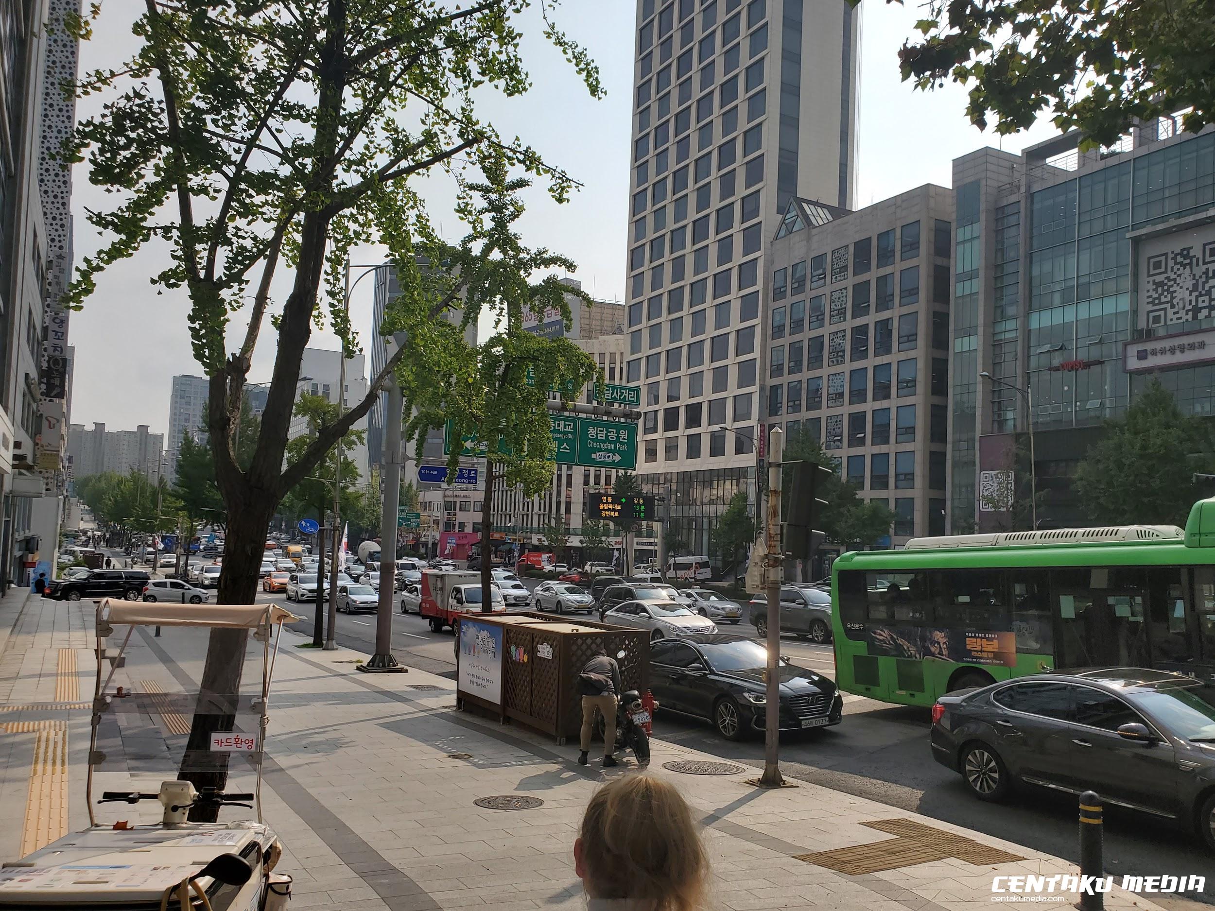 Cars and bus fill the streets in the Gangnam area.